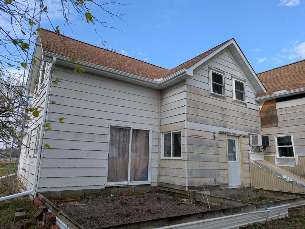 Gutters and Downspouts on old farm house.