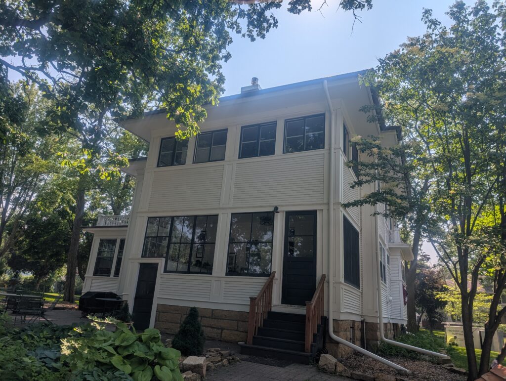 Side View of Copper half-round gutter and downspout installation on Baler Avenue in Mankato MN