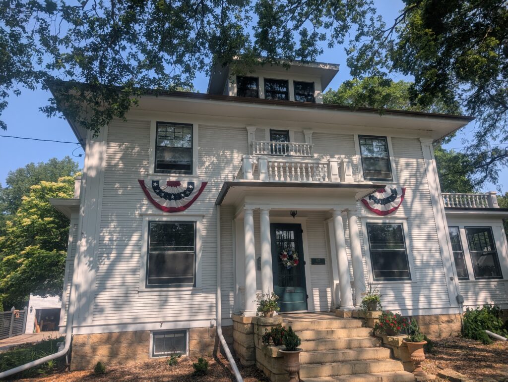 Front View of Copper half-round gutter and downspout installation on Baler Avenue in Mankato MN